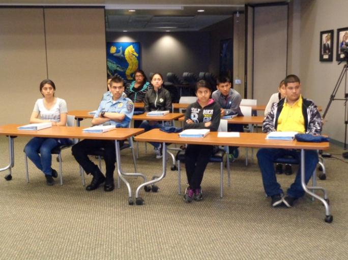 Program participants sitting in a class room.